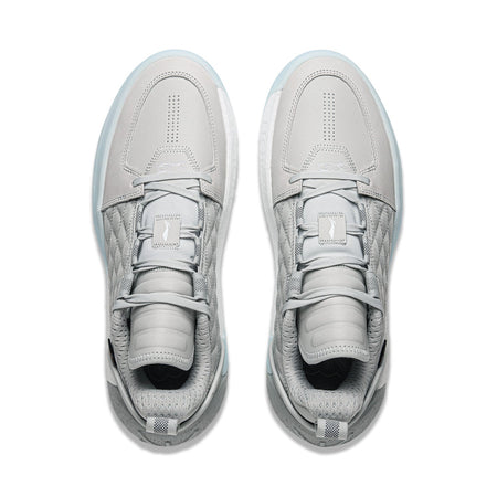 Pair of men's grey basketball shoes, front view, with perforated toe and lace-up