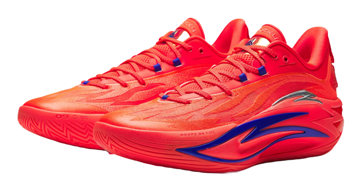 Pair of red basketball shoes with blue lace panels and curved side logo detail