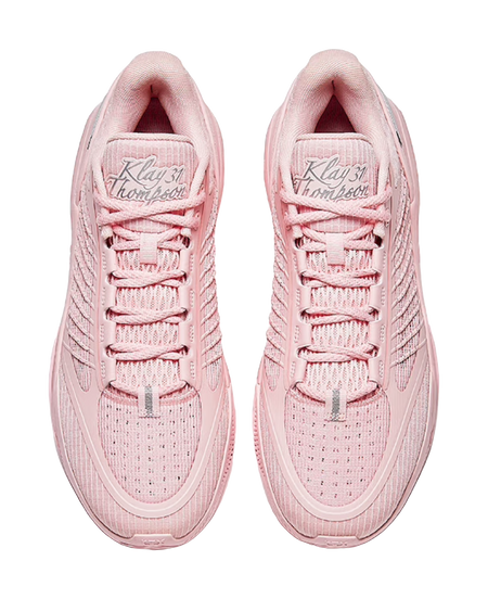 Pair of light pink sneakers showing lace-up tongue and embroidered inner logo