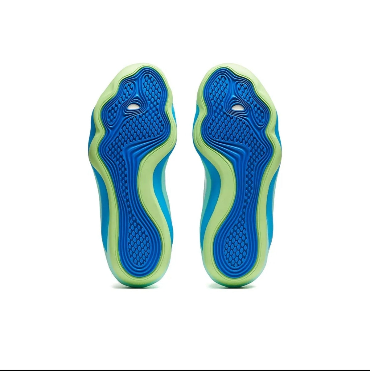 A pair of athletic shoe soles shown from the bottom, featuring a bright blue base with lime green and light blue wavy tread patterns, displayed on a white background within a mobile app screenshot.