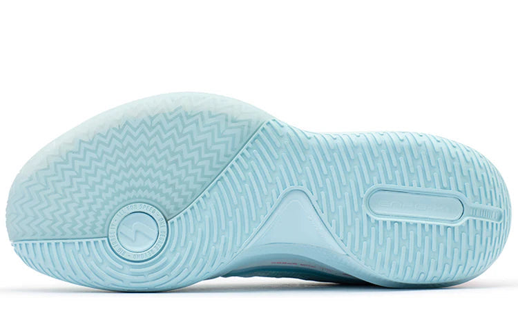 Outsole view of light blue basketball shoes with textured tread and zigzag pattern