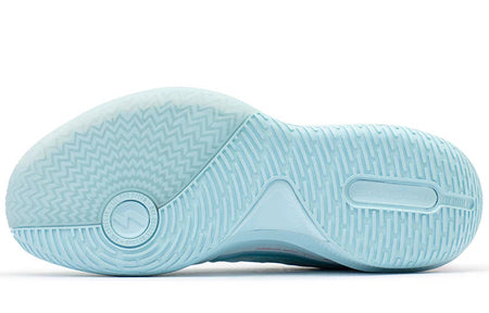 Outsole view of light blue basketball shoes with textured tread and zigzag pattern