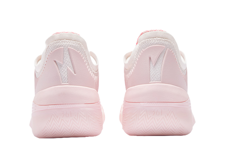 Light pink basketball shoe with heel tab and rear cushioning, lace-up