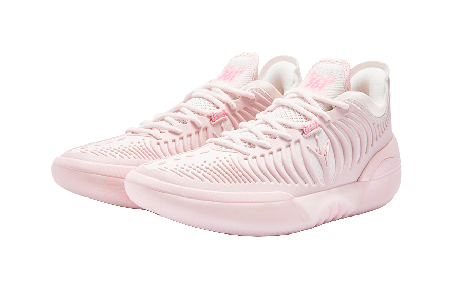 Light pink basketball shoe, laces and textured knit panels on upper