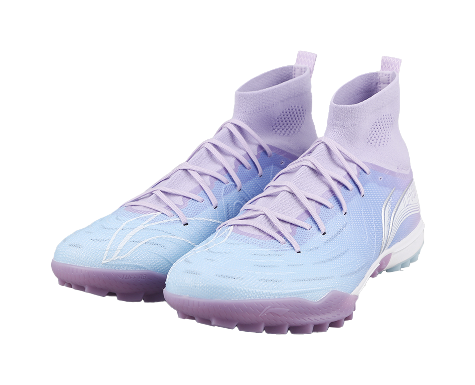 Pair of blue and lavender turf soccer shoes, front view, with white laces
