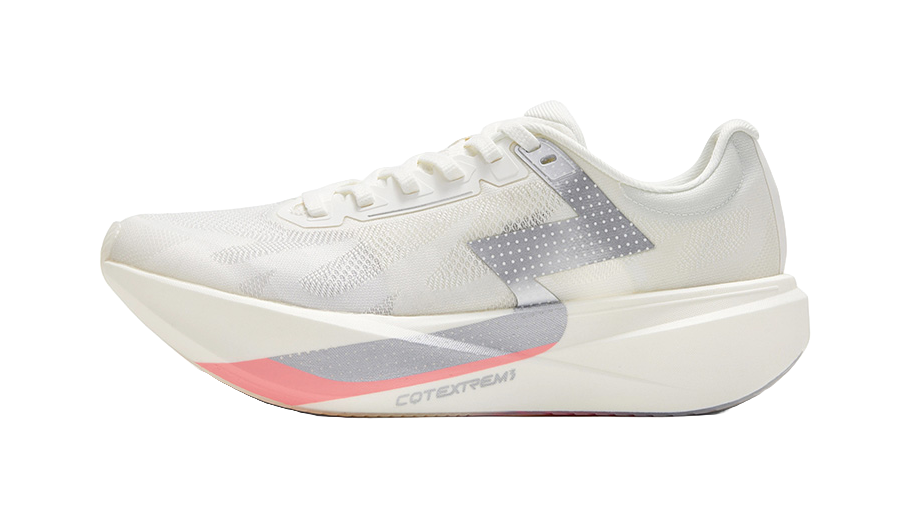Low running shoe with lace-up, silver white knit upper and gray side panel.