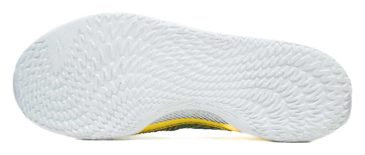 Basketball shoe outsole in white with textured grip pattern