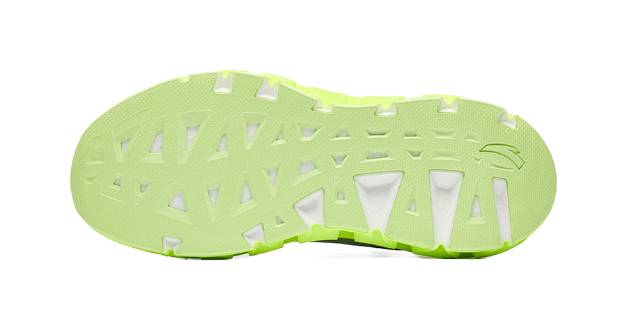 Sneaker outsole, neon green tread with repeating square and triangle lugs