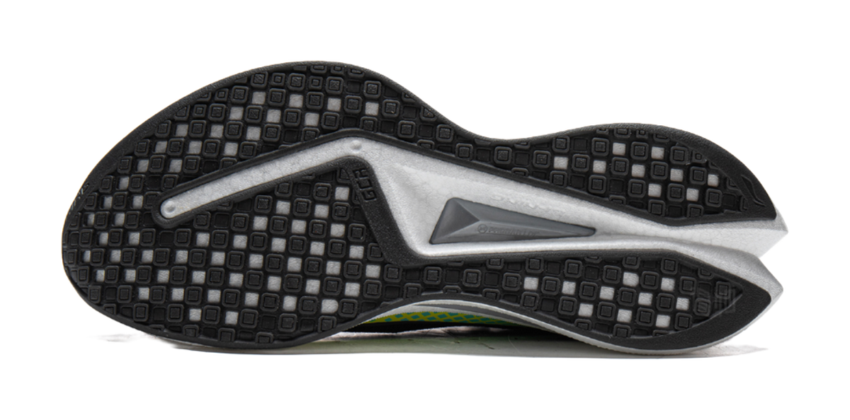 Unisex running shoe outsole view, dark tread with white sidewall and teal/yellow edge