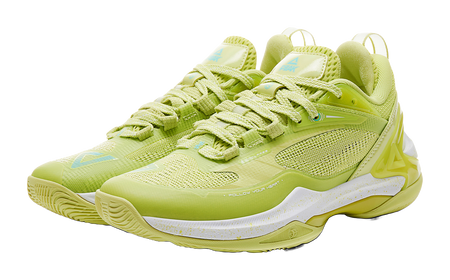 Light acid green basketball shoe front view with textured mesh and lace-up, white sole