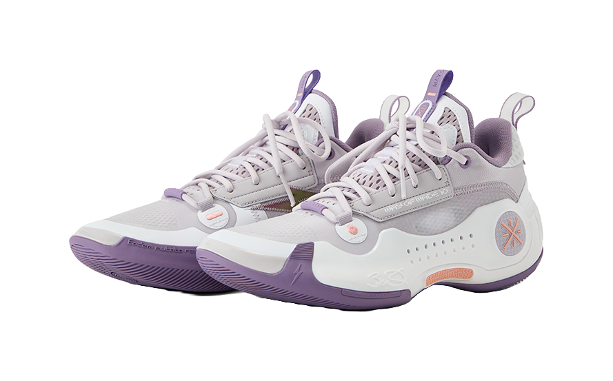 Pair of grey and white low-top basketball shoes with lavender trims and laces