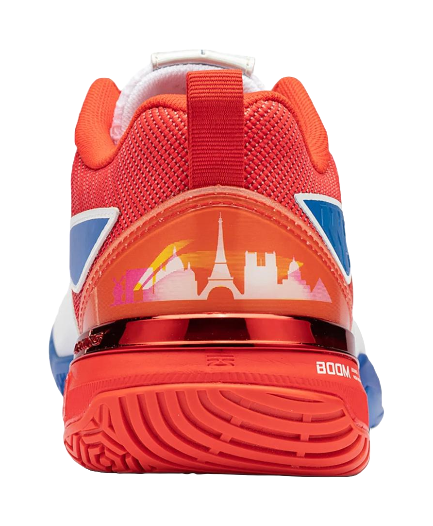 Red and blue unisex badminton shoe heel with city graphic and BOOM midsole