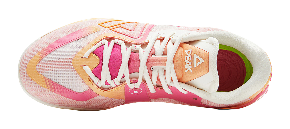 Pink basketball shoe with PEAK logo on heel, white laces, thick white sole