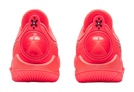Fluorescent red basketball shoes, heel view with molded support and logo badge
