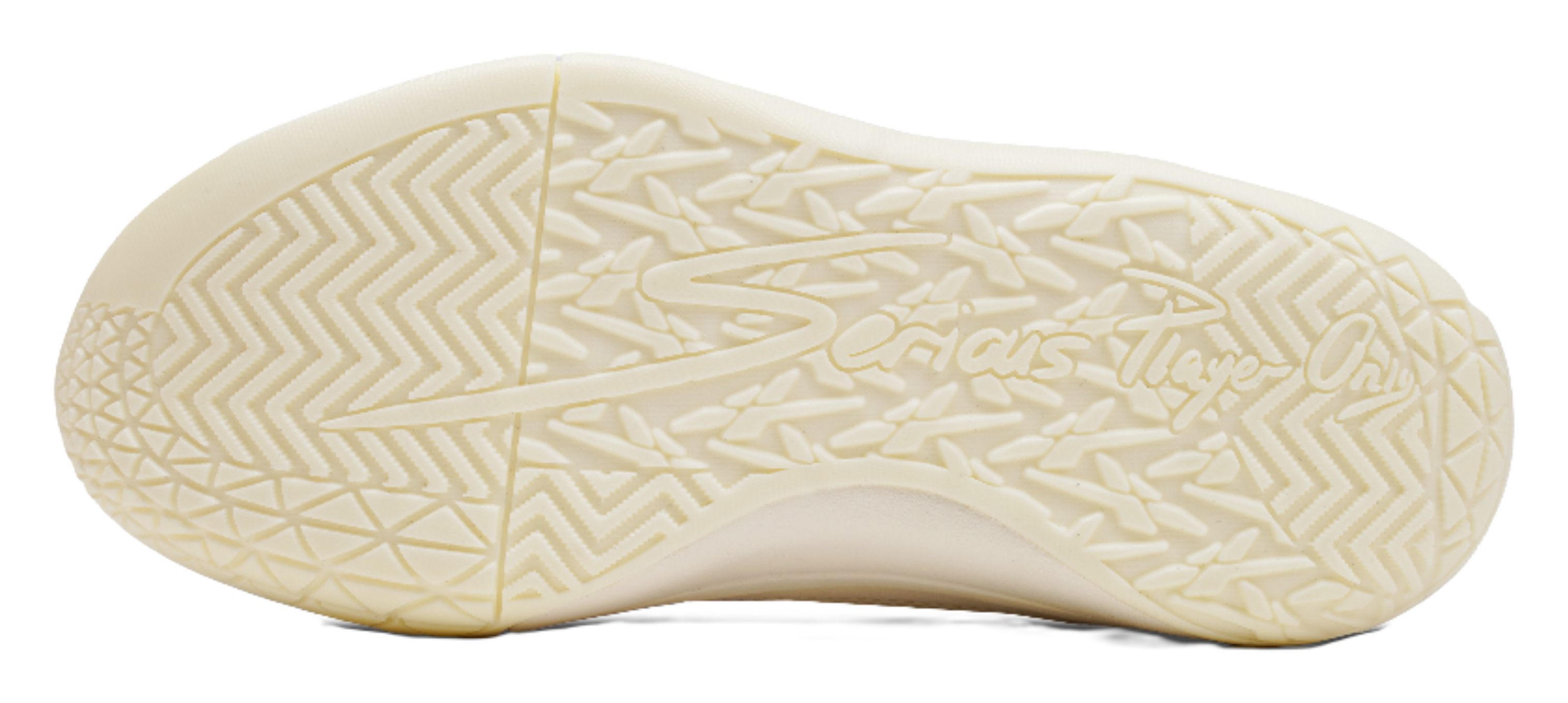 Cream rubber outsole with geometric traction tread pattern