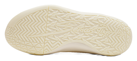 Cream rubber outsole with geometric traction tread pattern