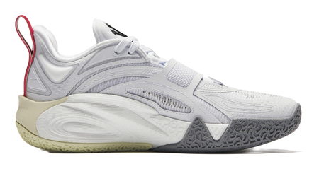 White basketball shoe with lace-up front, beige midsole, dark rubber outsole.