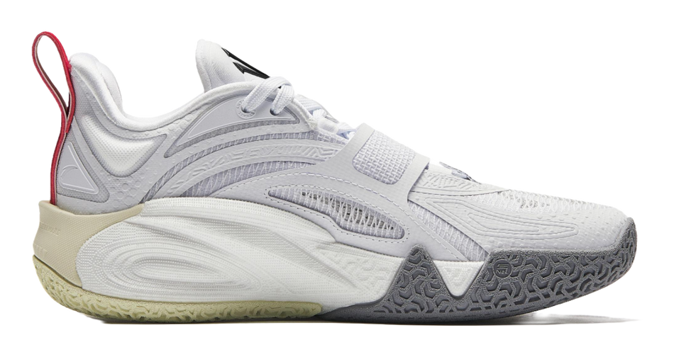 White basketball shoe with lace-up front, beige midsole, dark rubber outsole.