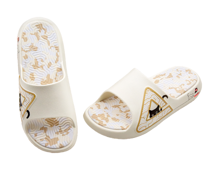 White slide sandal showing interior footbed and outsole with triangular cat emblem