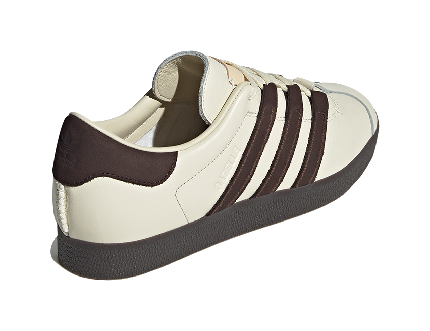 Unisex low-top skate shoes, cream leather heel with dark brown collar and stripes