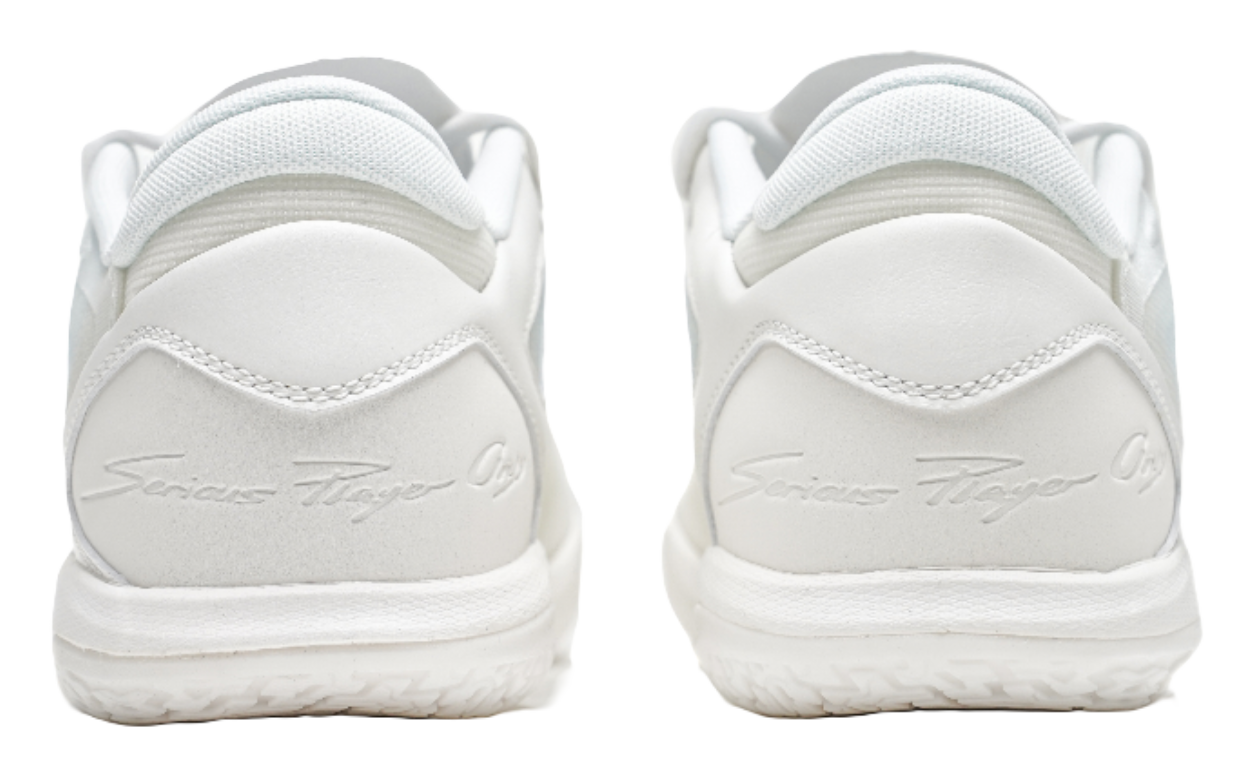 Pair of pure white low-top basketball shoes, rear view with cushioned heel