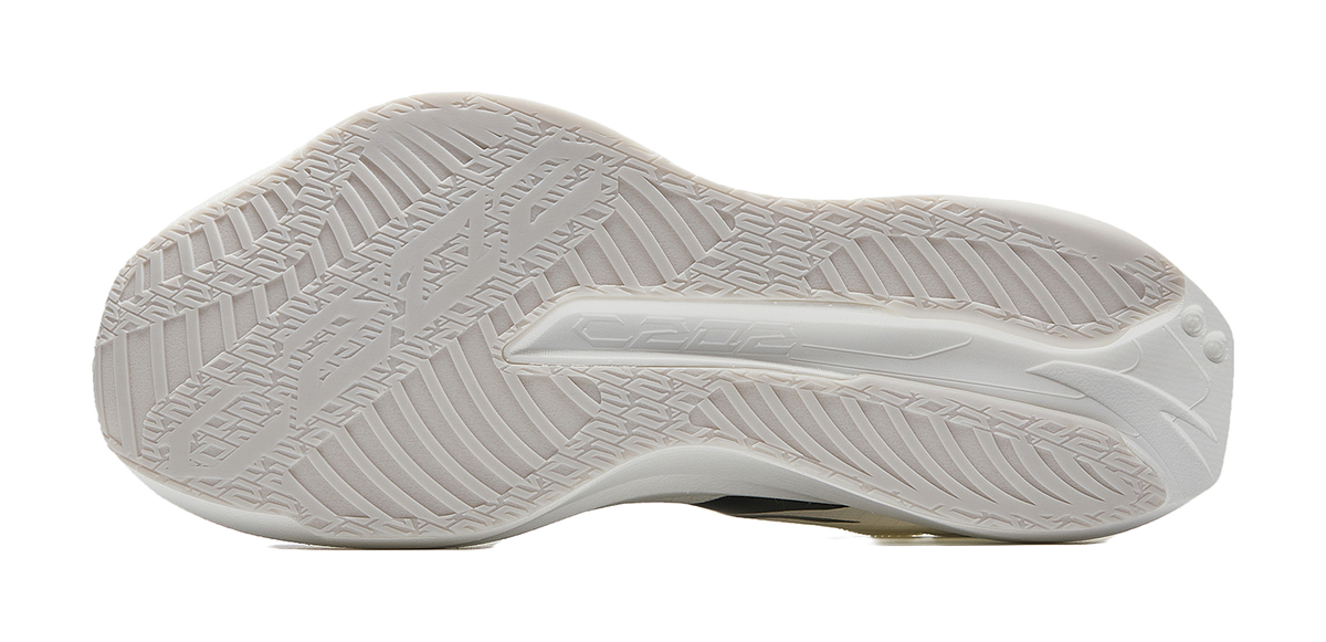 White running shoe outsole with textured tread pattern.