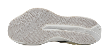 White running shoe outsole with textured tread pattern.