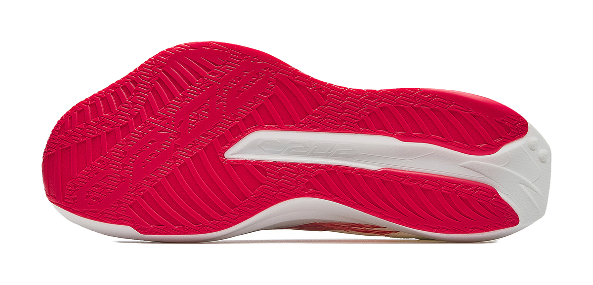 Red textured outsole with white midfoot stripe and flex grooves