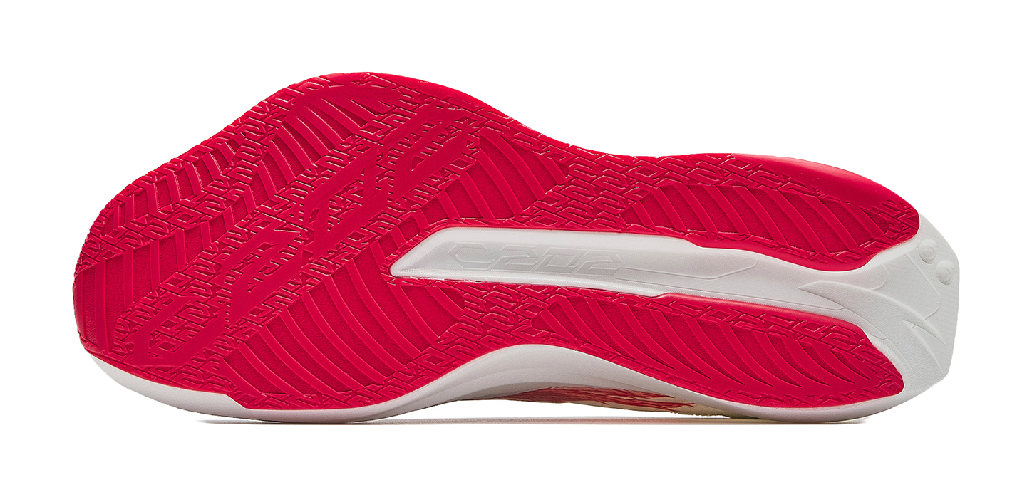 Red textured outsole with white midfoot stripe and flex grooves