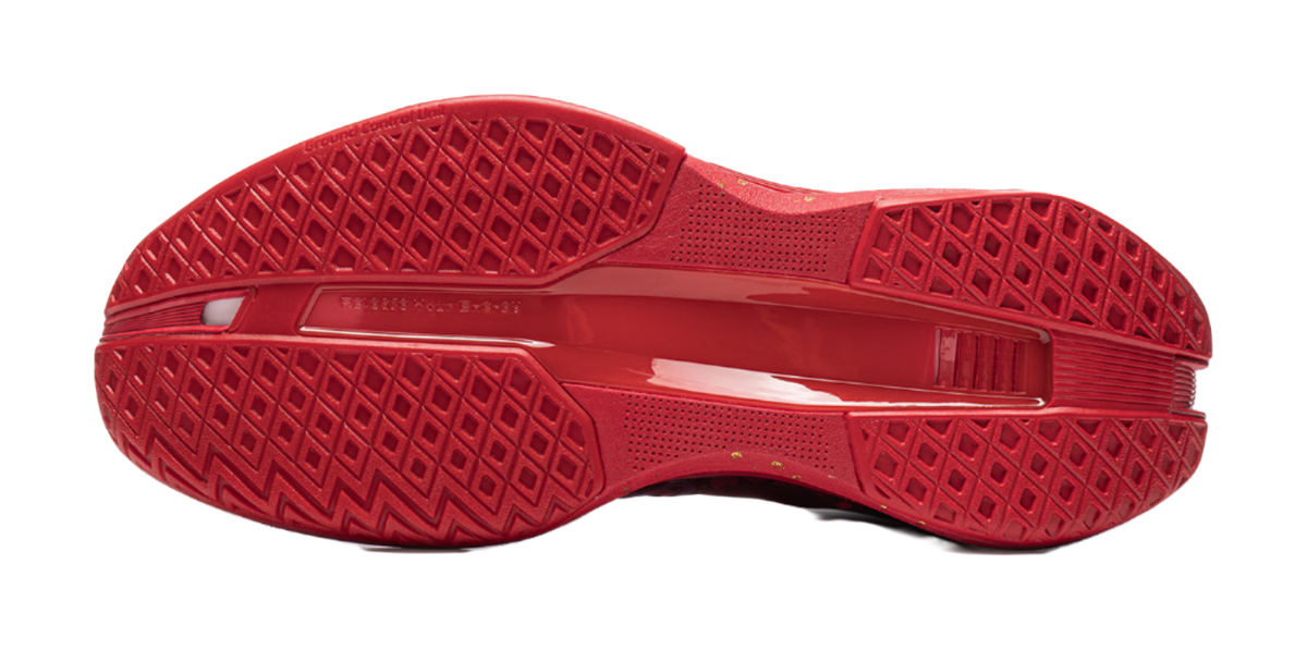 Unisex low basketball shoe outsole, red rubber tread with molded grip pattern