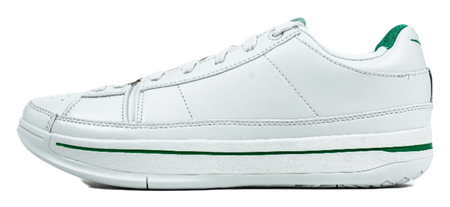 White low-top basketball shoes with green stripe trim and side logo detail