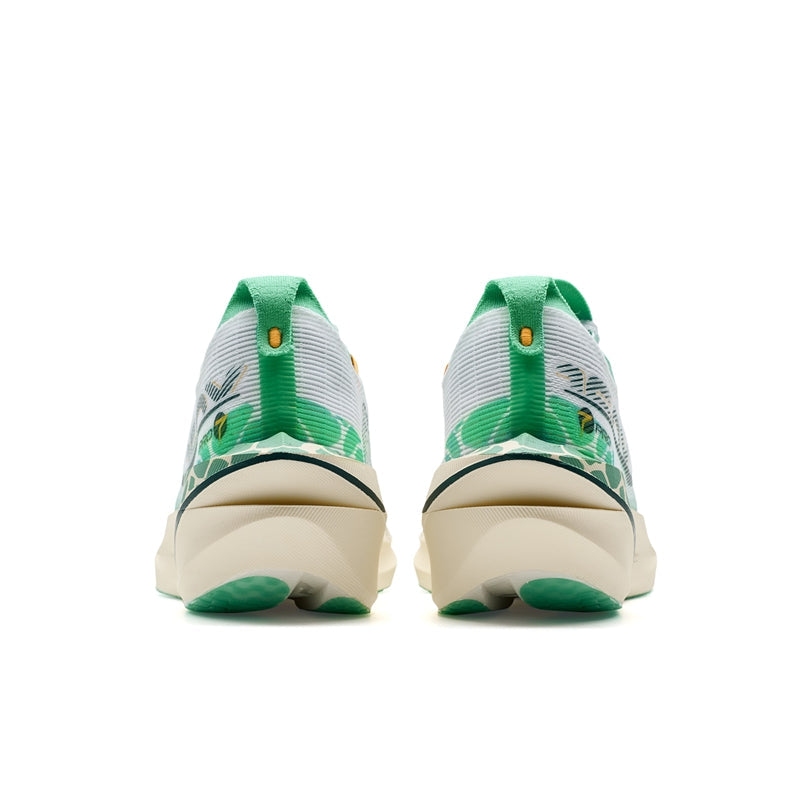 Pair of men's running shoes from behind, white uppers with green heel details