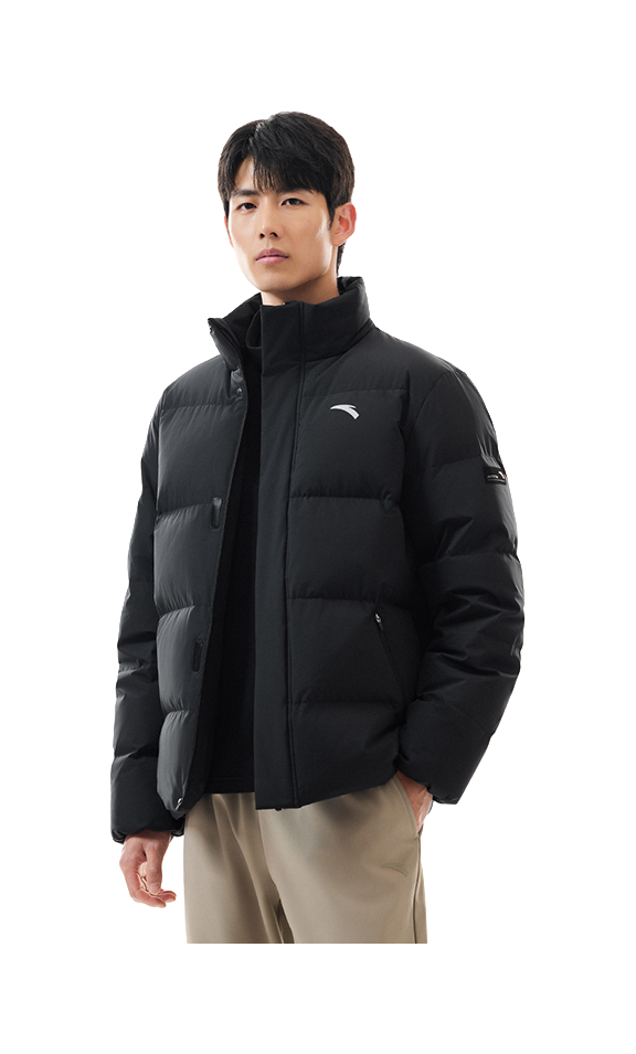 Men's black puffer down jacket on model, stand collar and zip front visible