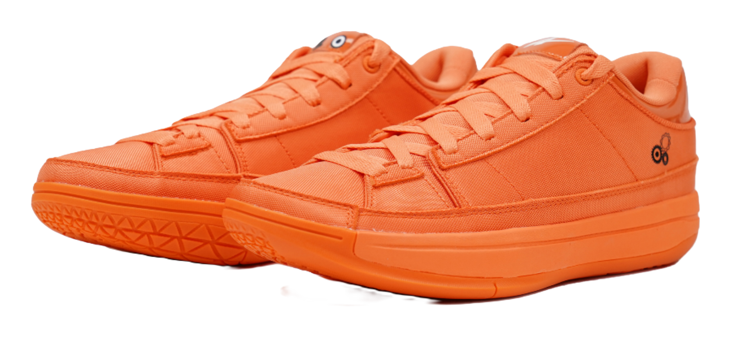 Orange lace-up basketball shoes with textured stripes on side