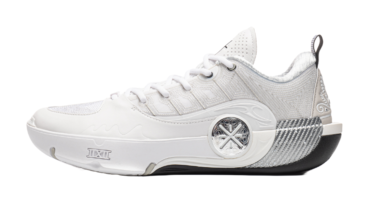 White basketball shoe with lace-up closure and sculpted side panel