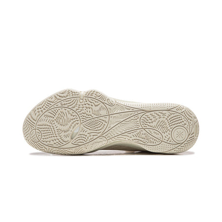 Men's basketball shoe outsole in paper white with multidirectional tread pattern for grip