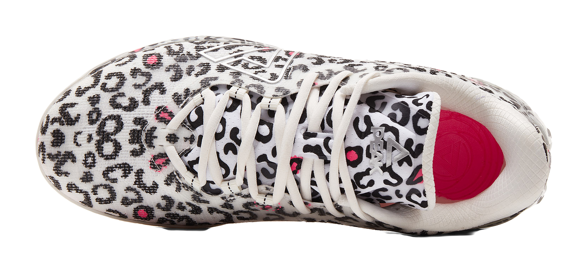 White low-top basketball shoe side view with leopard print and red inner lining