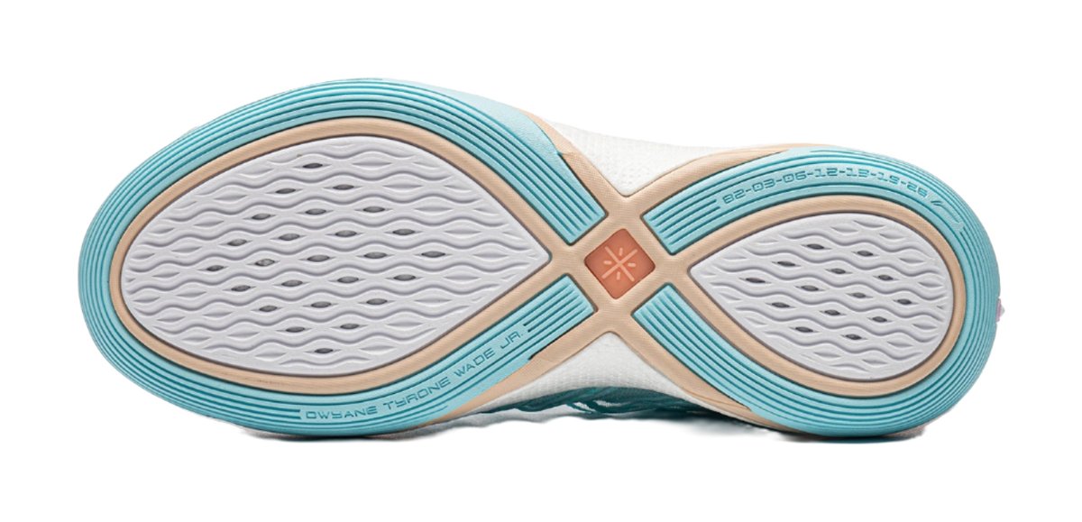 Light blue low basketball shoe outsole with textured traction and logo branding