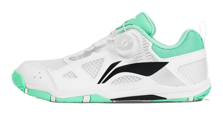 Table tennis shoe in white with green collar accents and black side logo