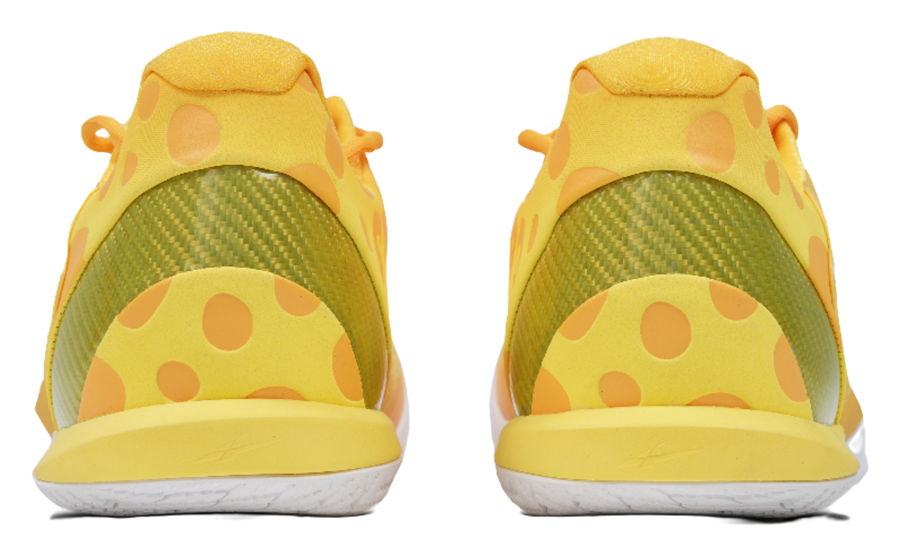 Low-top basketball shoes, heel view with green lining and yellow polka panels