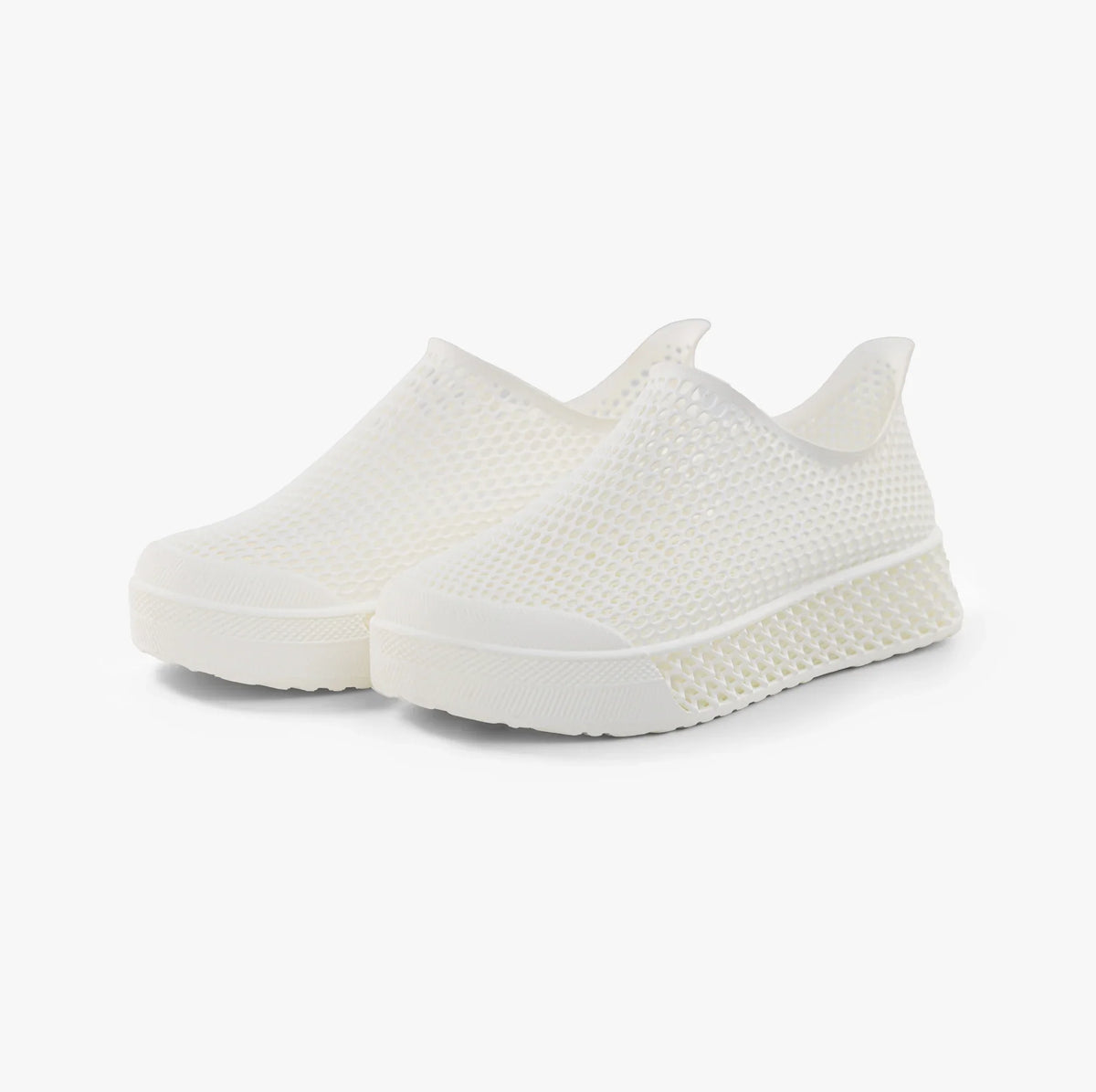 Pair of off-white slip-on sneakers with 3D printed mesh and cushioned sole