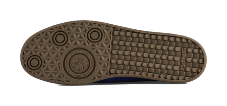 Brown outsole tread pattern with circular grip and traction texture.