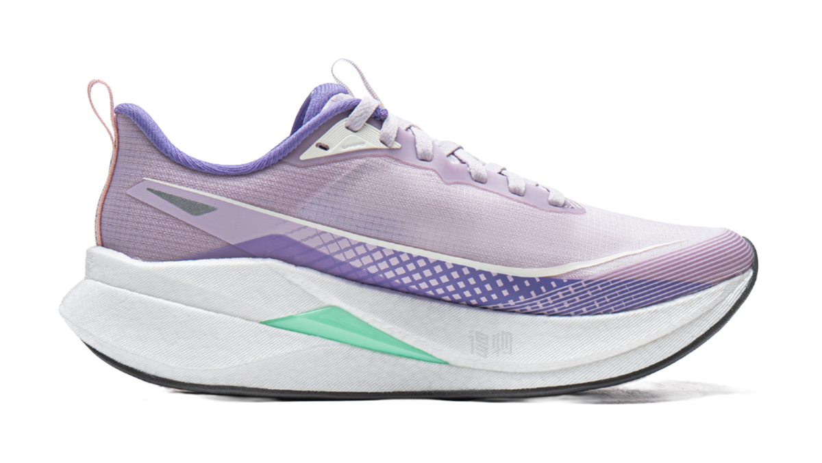 Lavender purple and white running shoe with purple side logo and green midfoot panel