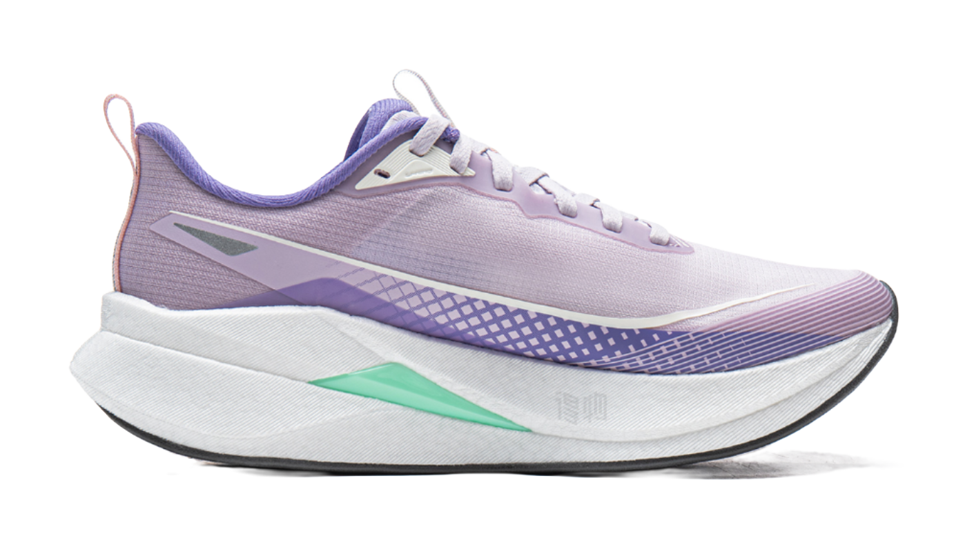 Lavender purple and white running shoe with purple side logo and green midfoot panel