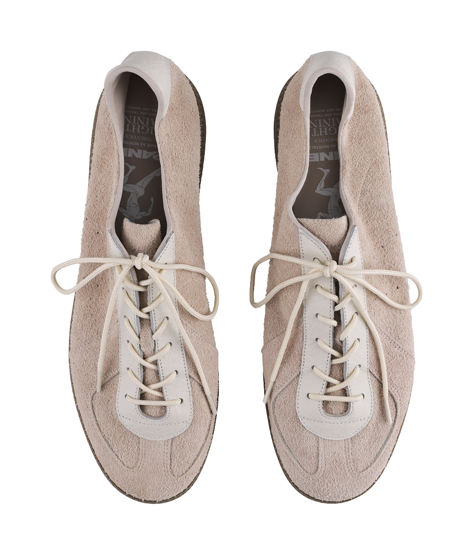Khaki suede sneakers with laces, front openings showing interior lining