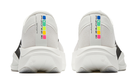 White running shoes with multicolor heel text and thick cushioned heel counter
