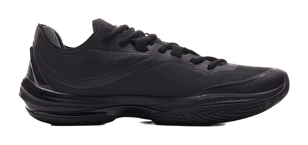 Black basketball shoe with textured upper, lace-up closure, and thick outsole.