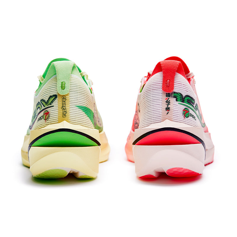 Marathon racing shoes pair, light green and red, rear view with padded heel and sole