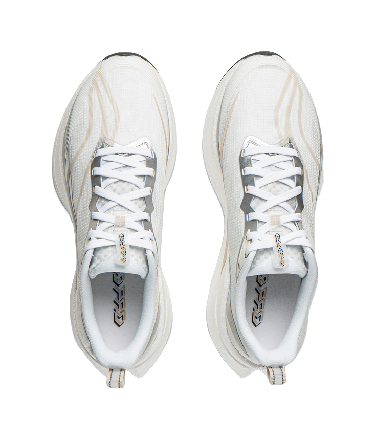 Pair of white running shoes with lace-up fronts and cushioned collars.