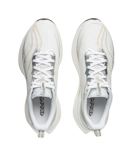 Pair of white running shoes with lace-up fronts and cushioned collars.